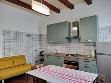 Bilocale attrezzato in elegante corte rustica