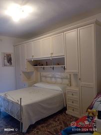 Deliziosa camera da letto a ponte