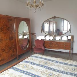 Camera matrimoniale in legno e marmo stile impero