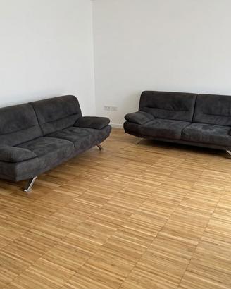 Coppia di divani in tessuto grigio antracite
