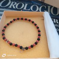 Bracciale in Oro 18kt  Color Corallo e Onice