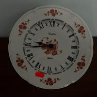 piatto da muro con orologio
