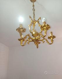 Lampadario  in ottone.  D' orato