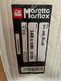 Materasso.  Rete in doghe