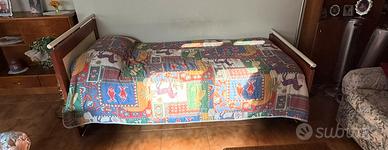 Letto comprensivo di materasso e coperta