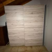 Armadio ante scorrevoli effetto legno