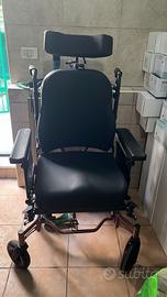 Sedia a rotelle basculante posturale