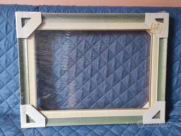 Due cornici per quadro  in legno.