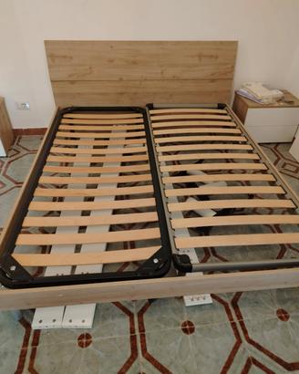 Giroletto matrimoniale in legno con testiera 