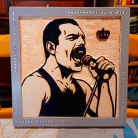 Quadro in legno scolpito e dipinto a mano.