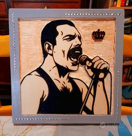 Quadro in legno scolpito e dipinto a mano.