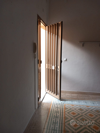 Vendita casa+ magazzino+striscia di terreno