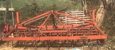 erpice a molle con rullo pieno