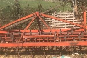 erpice a molle con rullo pieno