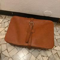 Valigia vintage in pelle color cuoio