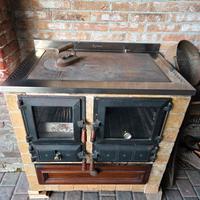 Cucina Putage` a legna