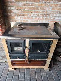 Cucina Putage` a legna