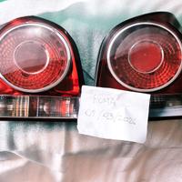 Coppia Fari VW Polo + Portalampada Originali