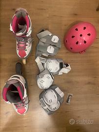Pattini a rotelle con accessori e casco