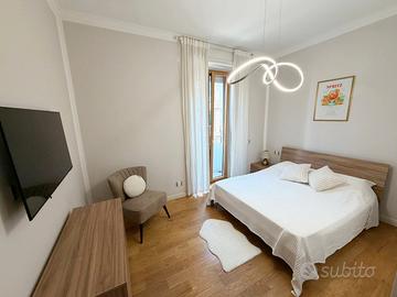 Stanza singola con letto matrimoniale