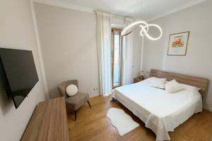 Stanza singola con letto matrimoniale