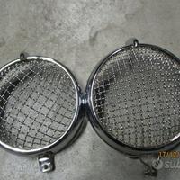 Cornici faro con griglia + ricambi vari moto
