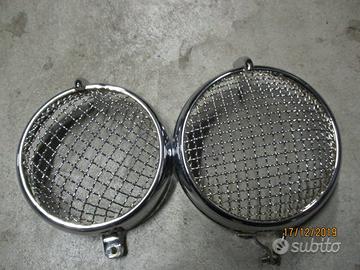 Cornici faro con griglia + ricambi vari moto