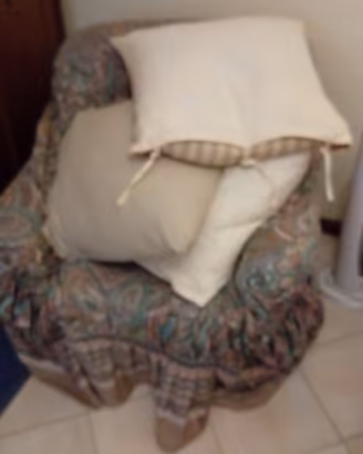 cuscini e poltrona