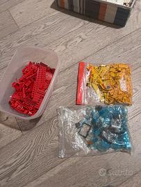 Lotto pezzi lego rossi, giallo, trasparenti