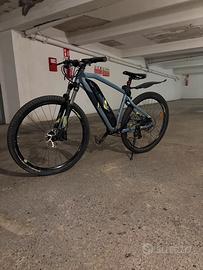 Bicicletta Rockrider E-ST 100 E-Bike MTB