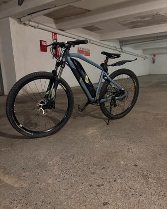 Bicicletta Rockrider E-ST 100 E-Bike MTB