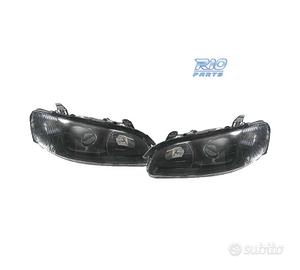FARI PER OPEL OMEGA 94-99 LENTE A LENTE NERA