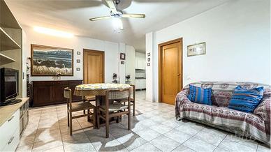 Ampio trilocale con cortile