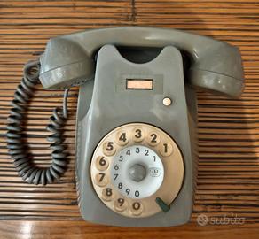 Telefono vintage a disco bigrigio da parete