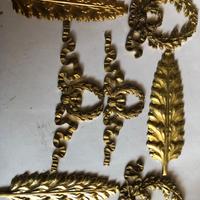 Fregi ottone