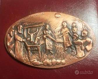 Placchetta medaglia in bronzo.
