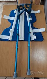 Ginocchiera tutore e stampelle ortopediche