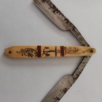 Antico rasoio doppia lama