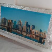 Quadro con cornice argento. 