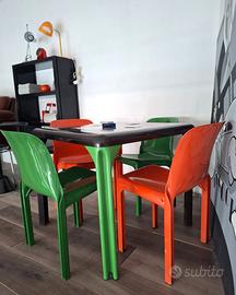 Tavolo “STADIO” e sedie SELENE di Artemide,'70