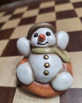 Pupazzo di neve su ciambella/slittino  Thun