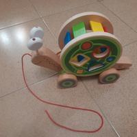 HAPE gioco Legno  Lumaca delle forme trainabile