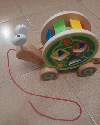 HAPE gioco Legno  Lumaca delle forme trainabile