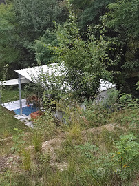 Terreno con roulotte in montagna zona tranquilla