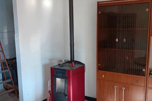 Appartamento con box auto e piccolo terreno orto