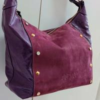 Borsa da donna vera pelle colore viola Alta Moda.