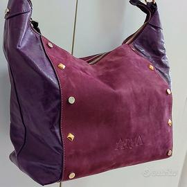 Borsa da donna vera pelle colore viola Alta Moda.