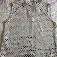 Maglia elegante e luminosa con paillettes