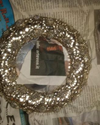 Cornice argento rotonda