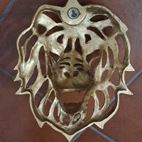 decorazione da parete a forma di testa di leone